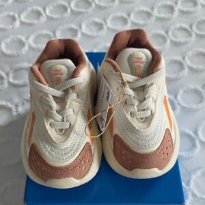 Adidas Ozelia EL I Kids Cream and Tan Sneakers with Orange Accents